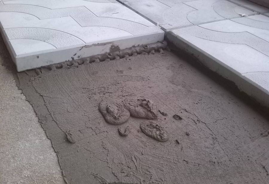 Пошаговая укладка тротуарной плитки на бетонное основание