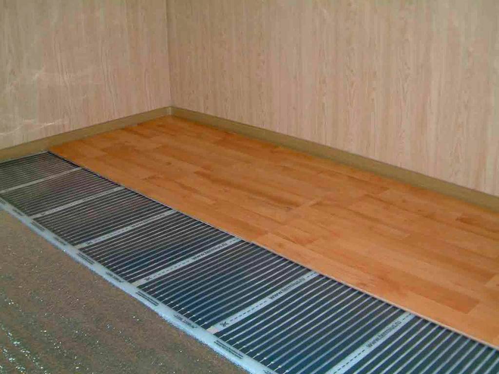 Теплый пол под ламинат на бетонный пол - какой выбрать и как уложить